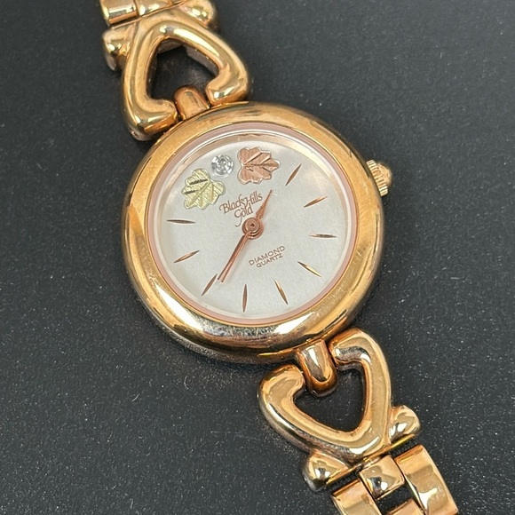 EUC Black Hills Gold women’s Watch with genuine diamonds d & reversible band